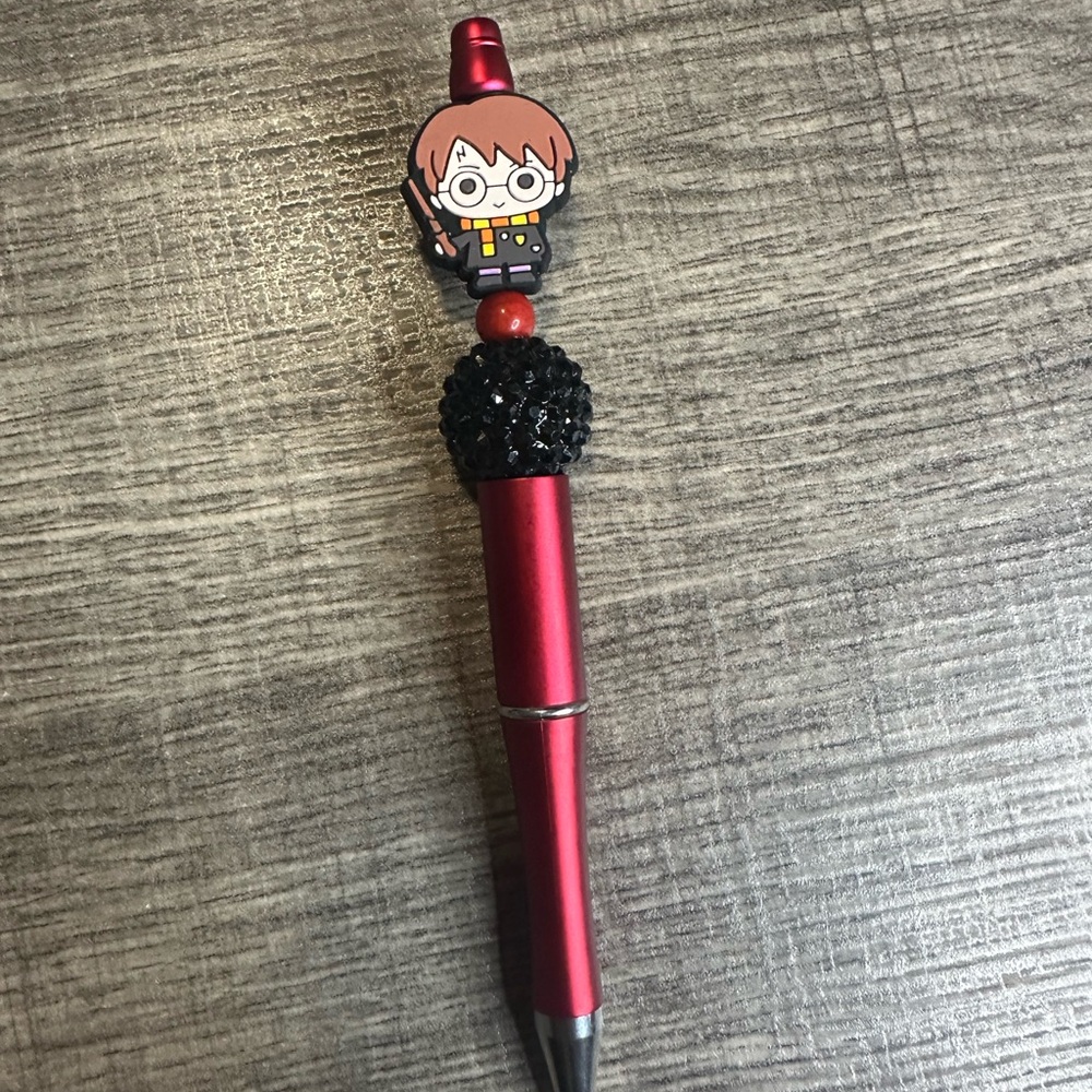 Red and Black Stationery Pen with Character Design